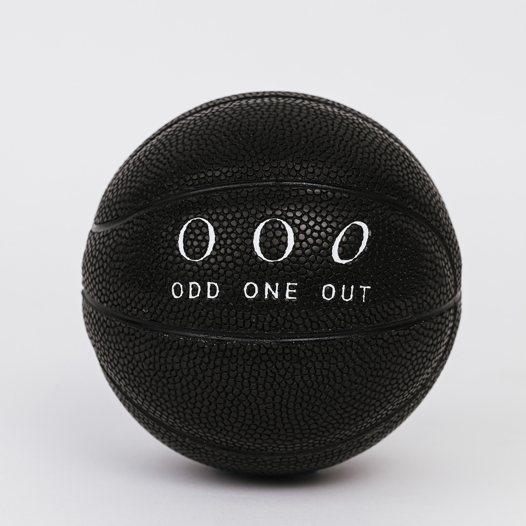 Black rubber odd one out mini basketball -black ash