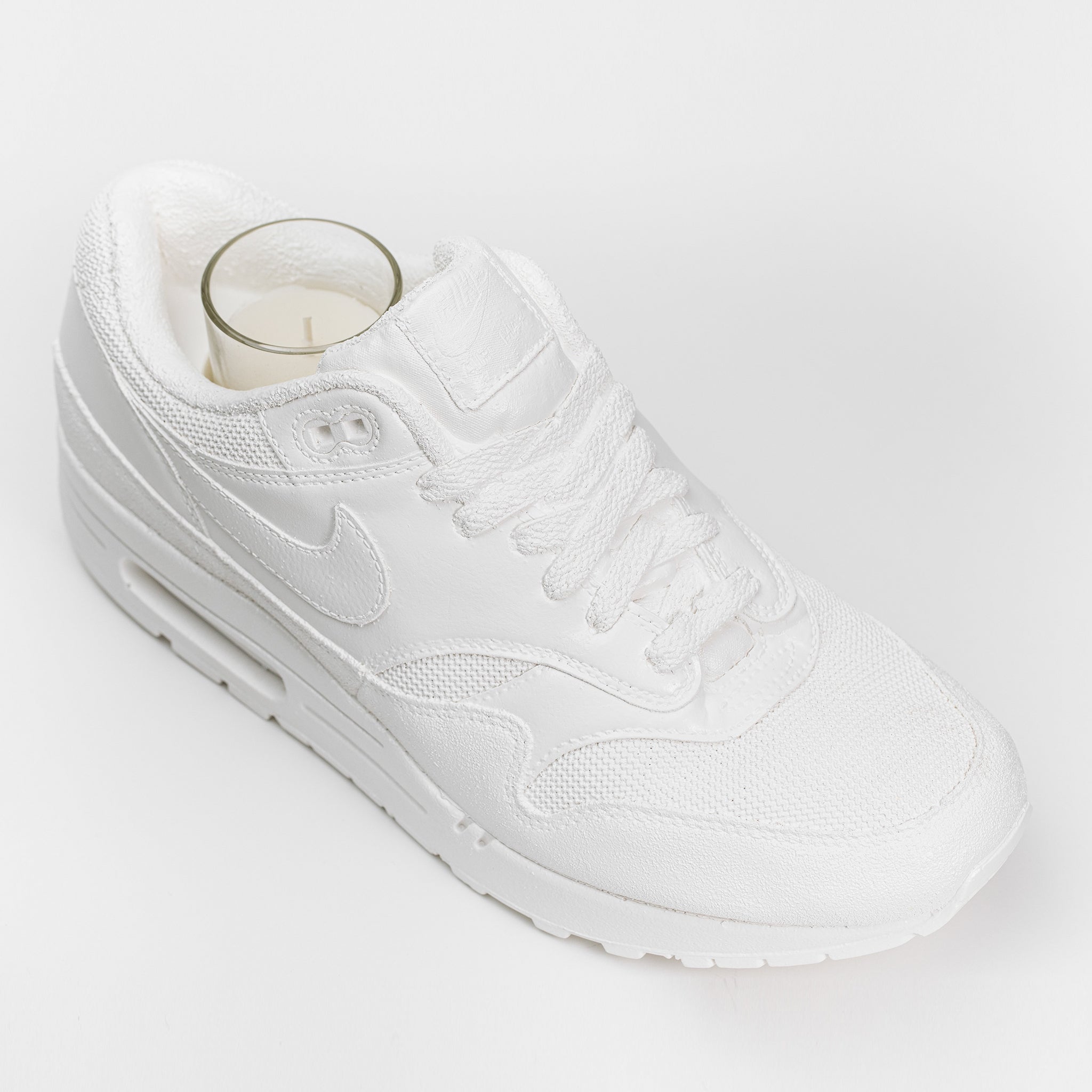 Gypsum stone casted nike air max sneaker candle holder with a votive candle