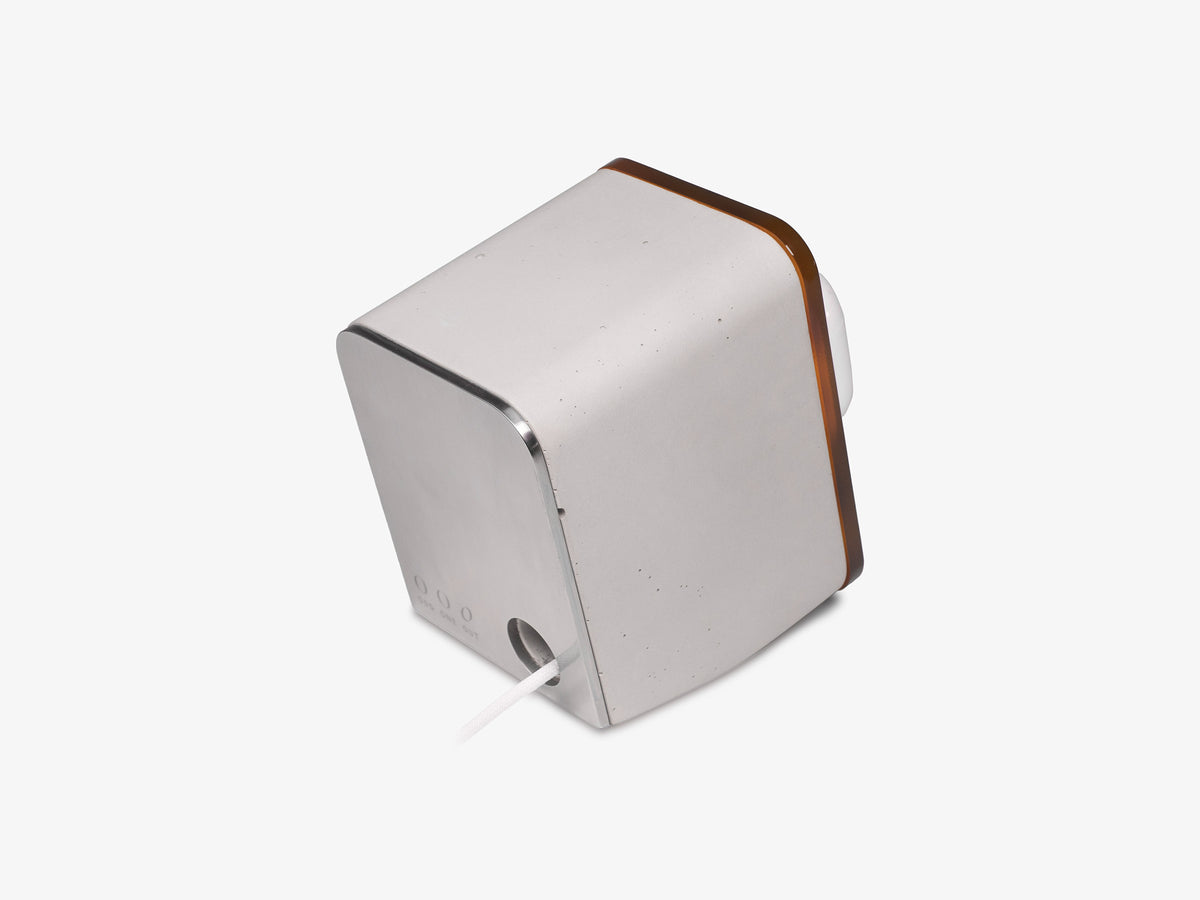Tortoiseshell AirPod Pro Dock, in use, back-right view