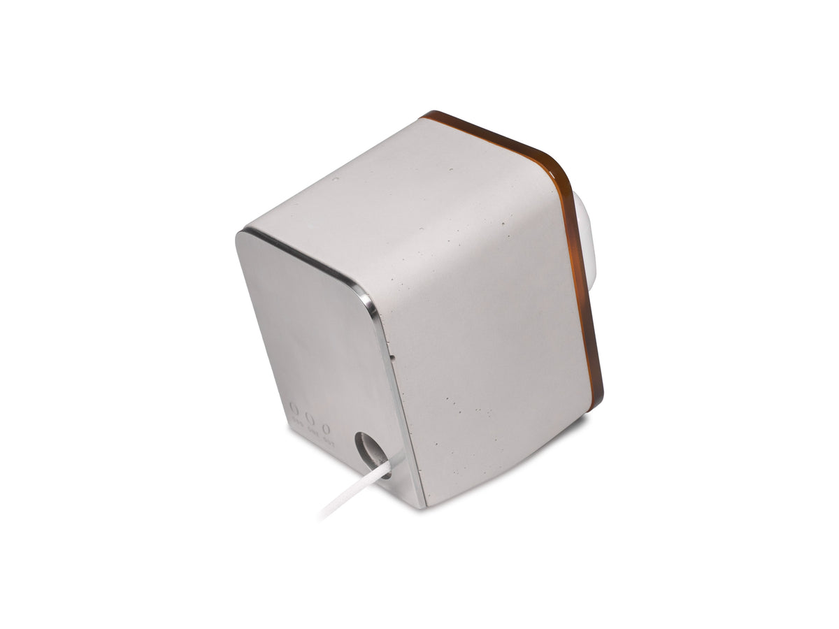 Tortoiseshell AirPod Pro Dock, in use, back-right view