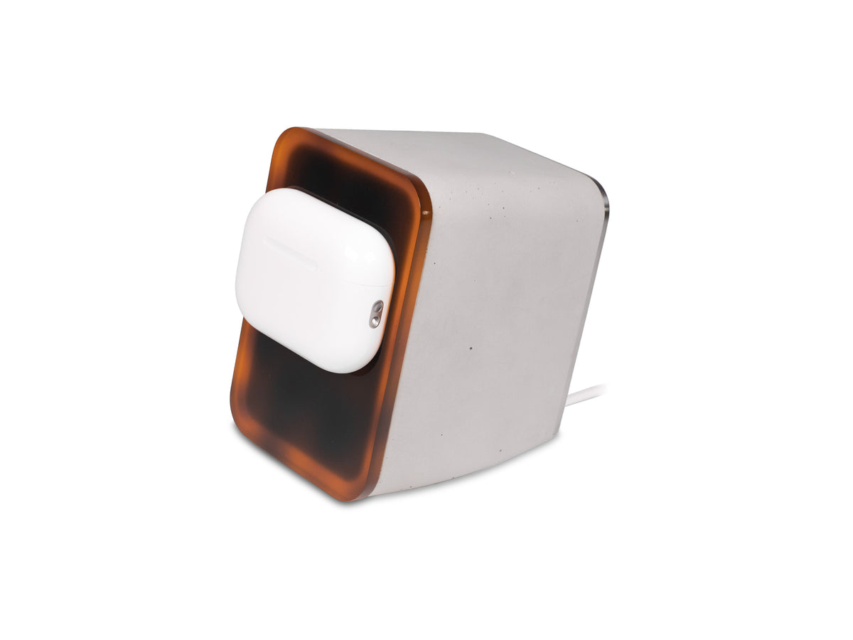 Tortoiseshell AirPod Pro Dock, with airpods, front-left view