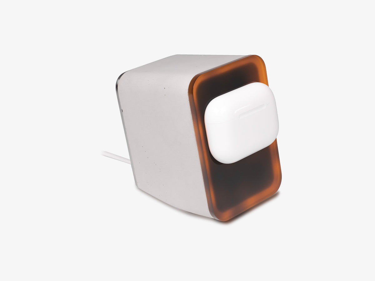 Tortoiseshell AirPod Pro Dock, with airpods, front-right view