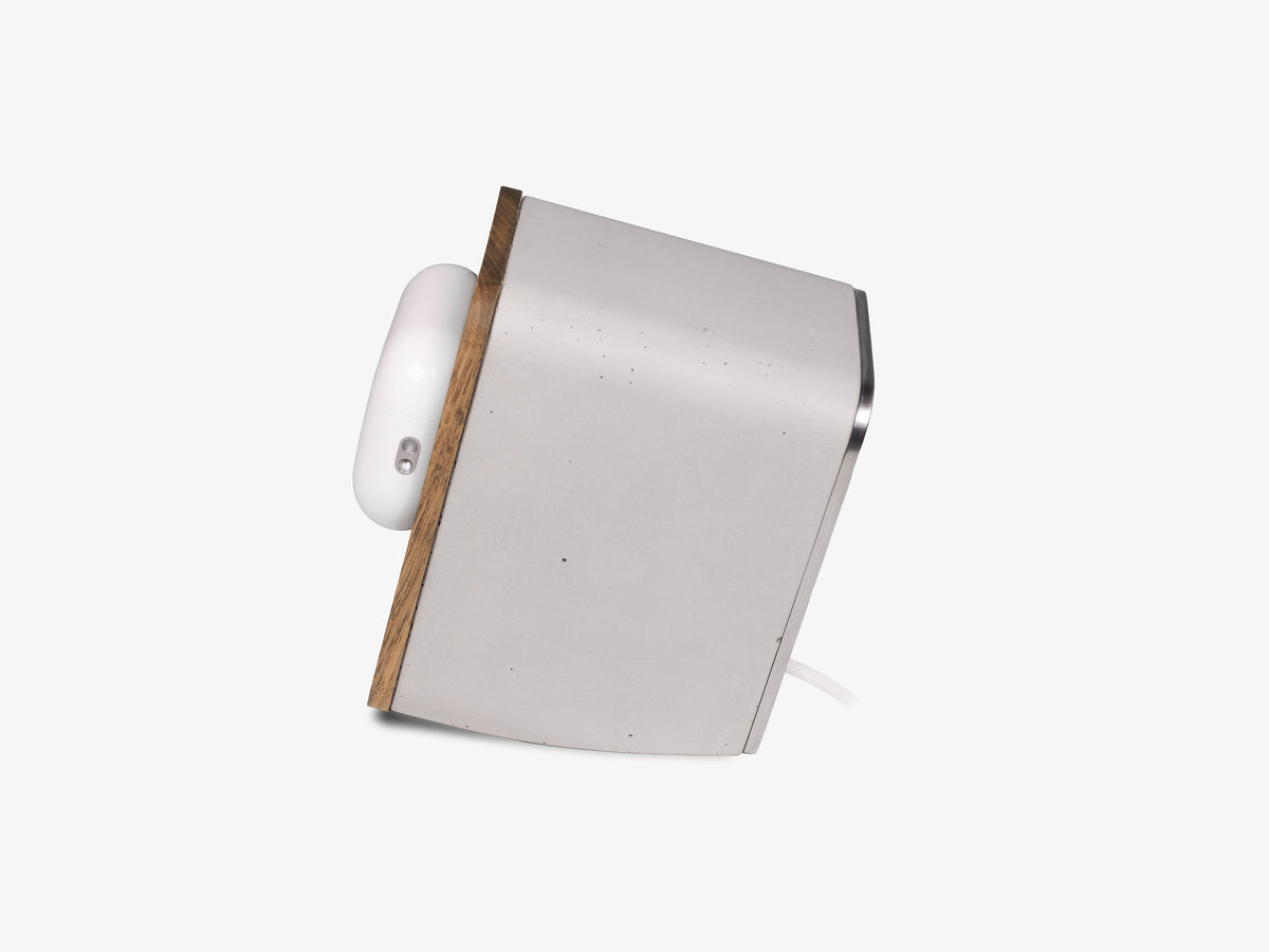 Walnut AirPod Pro Dock, in use, left view