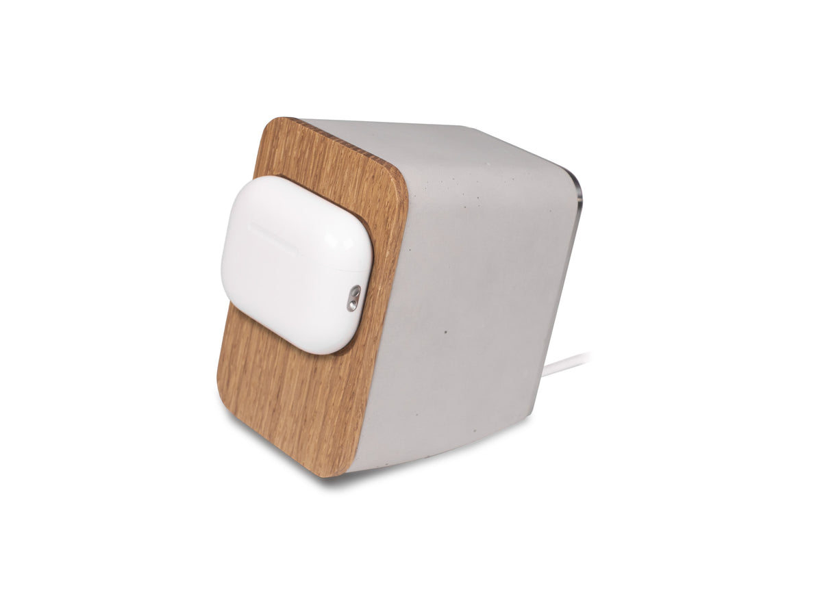 White Oak AirPod Pro Dock, with airpods, front-left view