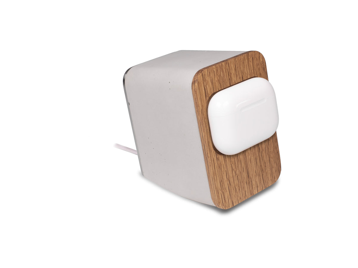 White Oak AirPod Pro Dock, in use, front-right view