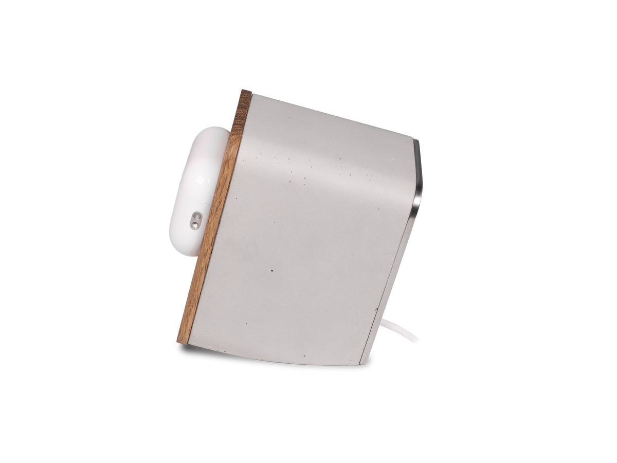 White Oak AirPod Pro Dock, in use, left view