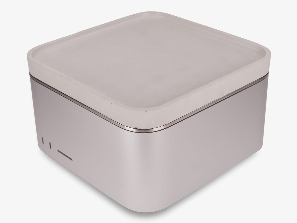 Stainless Steel Mac Studio Tray, in use, front-left view
