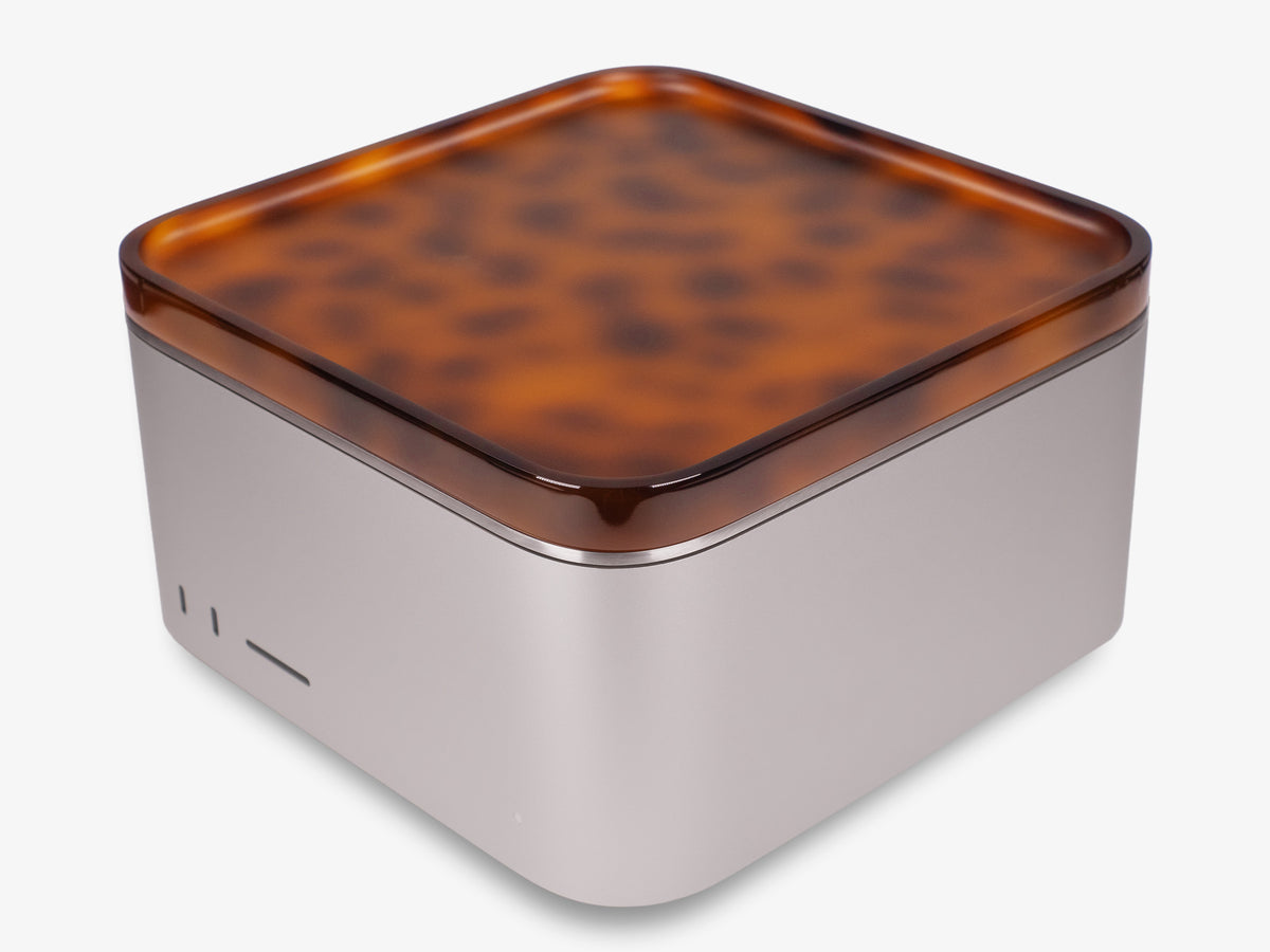 Tortoiseshell Mac Studio Tray, with mac studio, front-left view