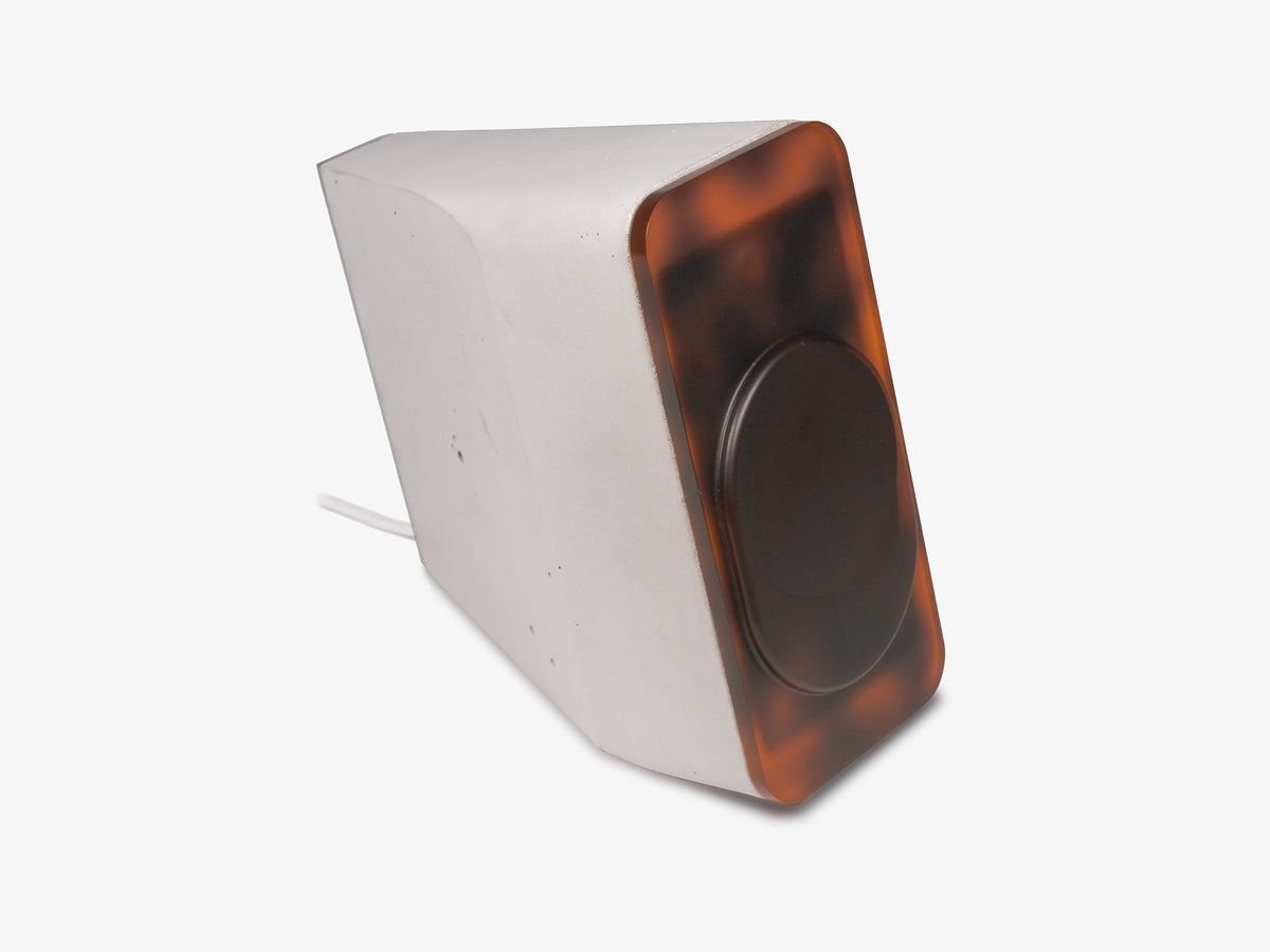Tortoiseshell iPhone Dock, upright, charger only, front-right view