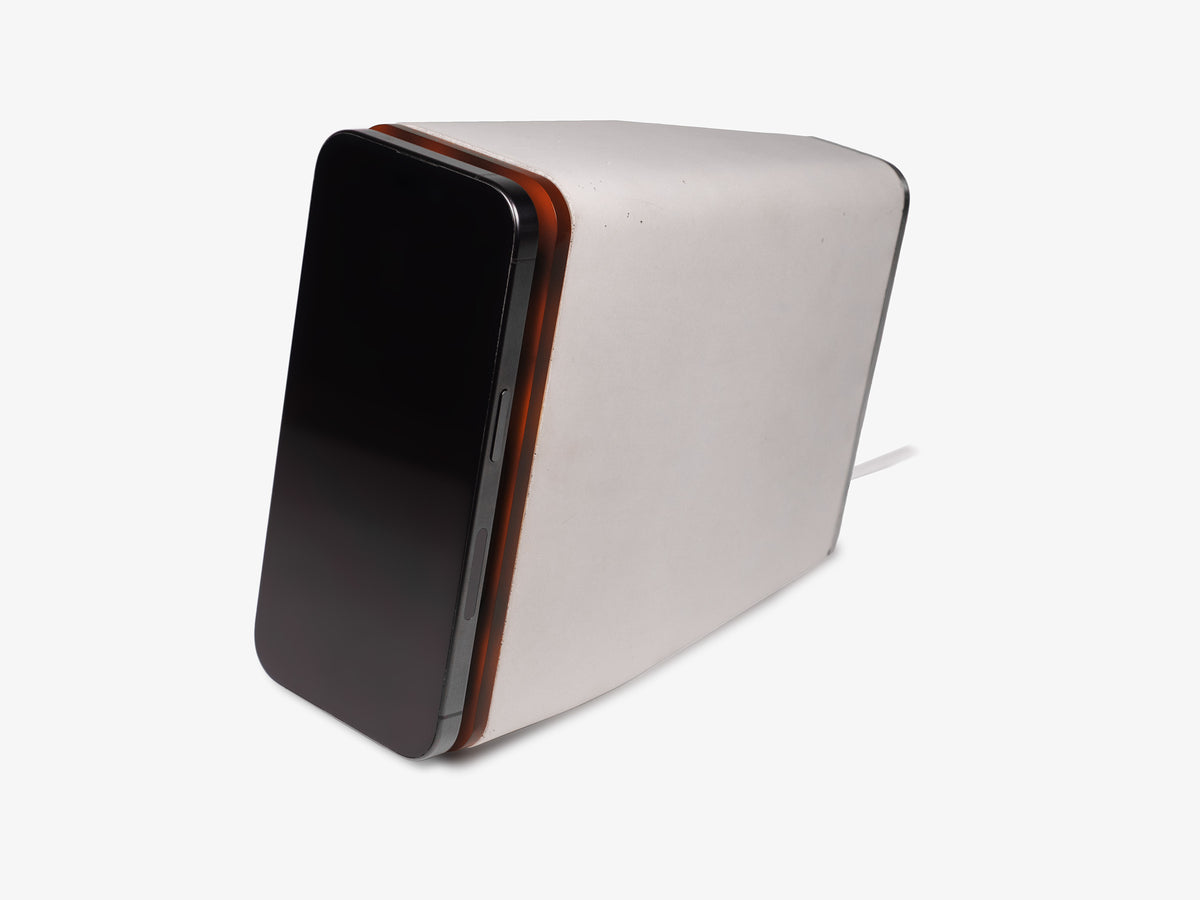 Tortoiseshell iPhone Dock, upright, with iphone, front-left view