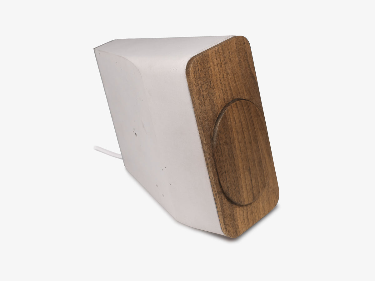Walnut iPhone Dock, upright, charger only, front-right view