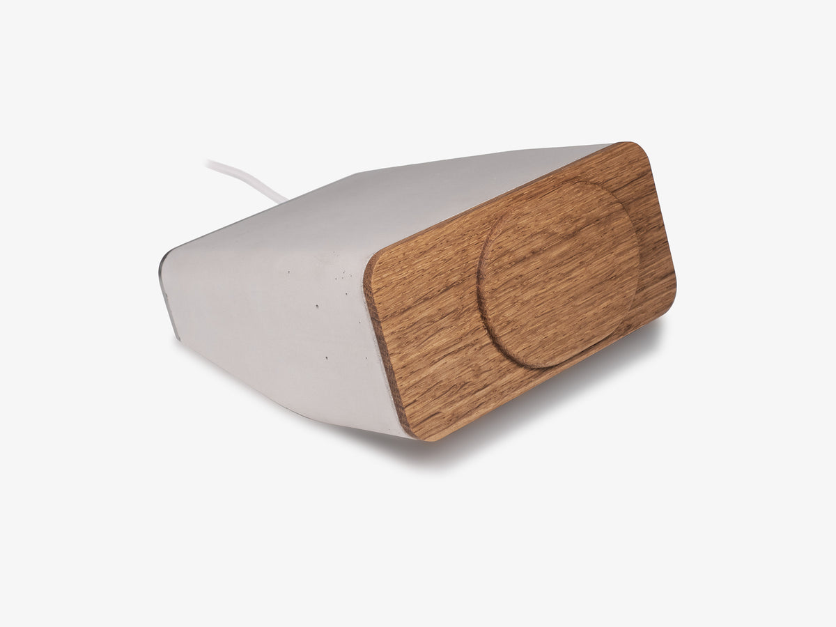 White Oak iPhone Dock, standby, charger only, front-right view