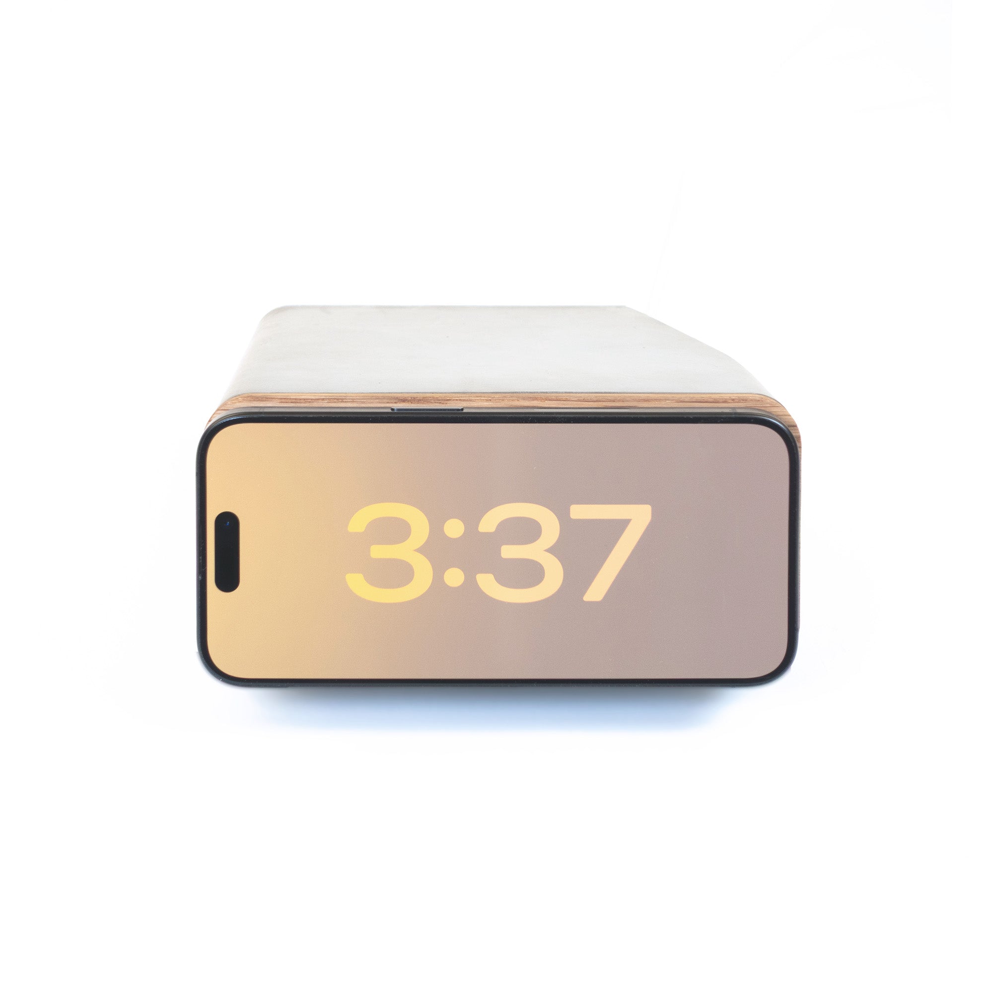 Side profile showing MagSafe iPhone charger‚ Japandi-inspired architecture and materials