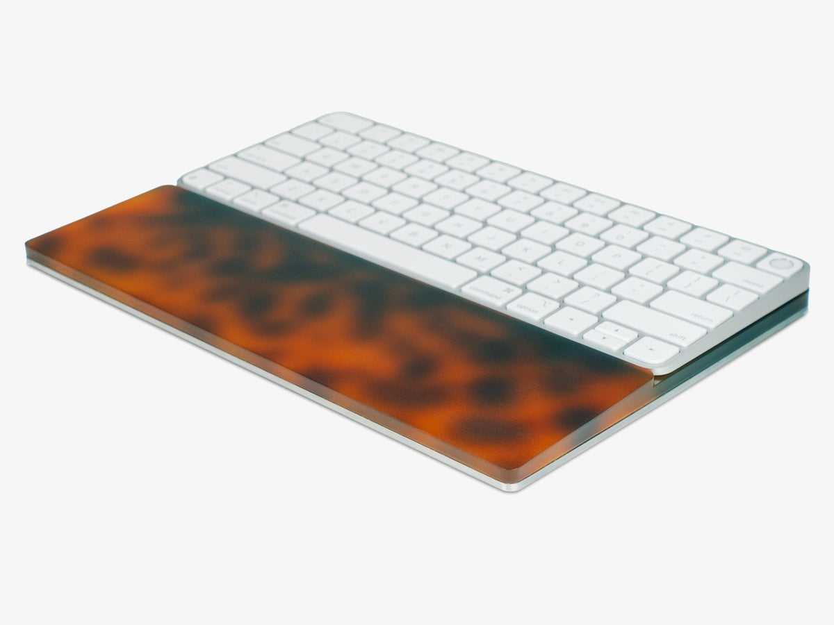 Tortoiseshell Standard Keyboard Tray, with keyboard, front-left view