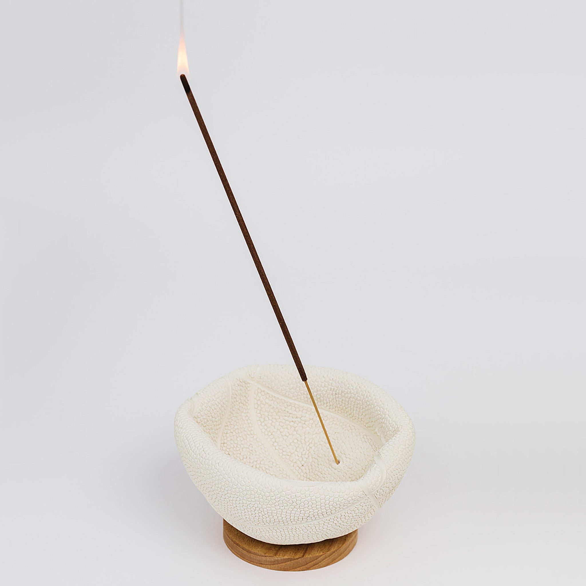 Incense burning in the mini basketball incense holder